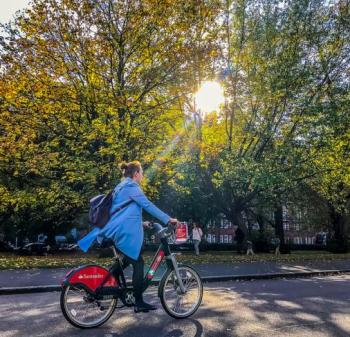 Woman cycling on a Santander Cycle - Zero Emissions Network