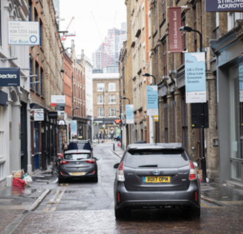 London street with electric car